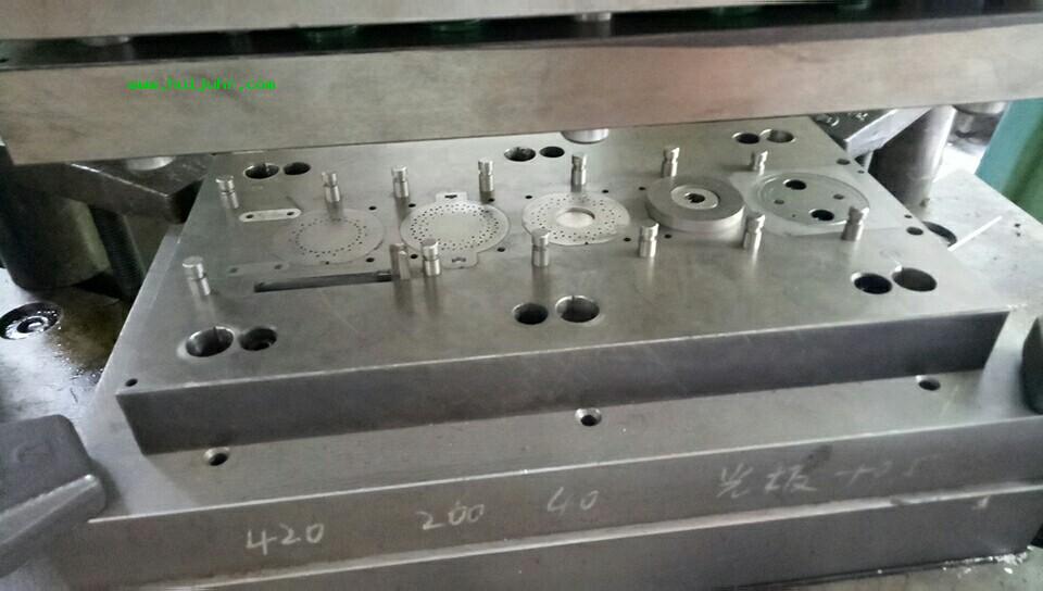 Silencer stamping die